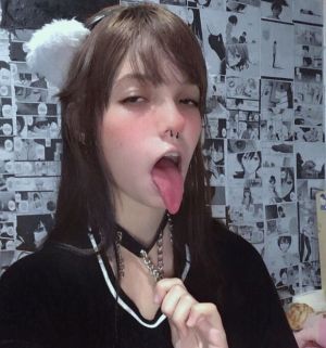 Pic - Pierced Nose Teenager Rams Tongue Out